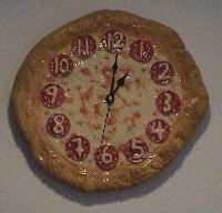 The famous Pizza Clock from pizzatherapy.com