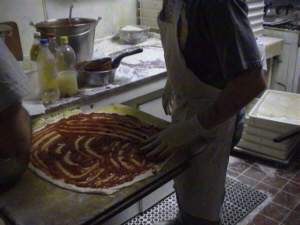Making a pizza at Sally's Apizza!